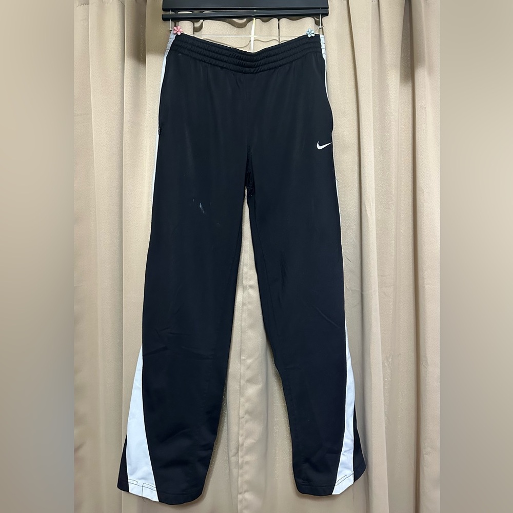 Nike sweatpants - black and white with zippers on the bottom of each pant leg